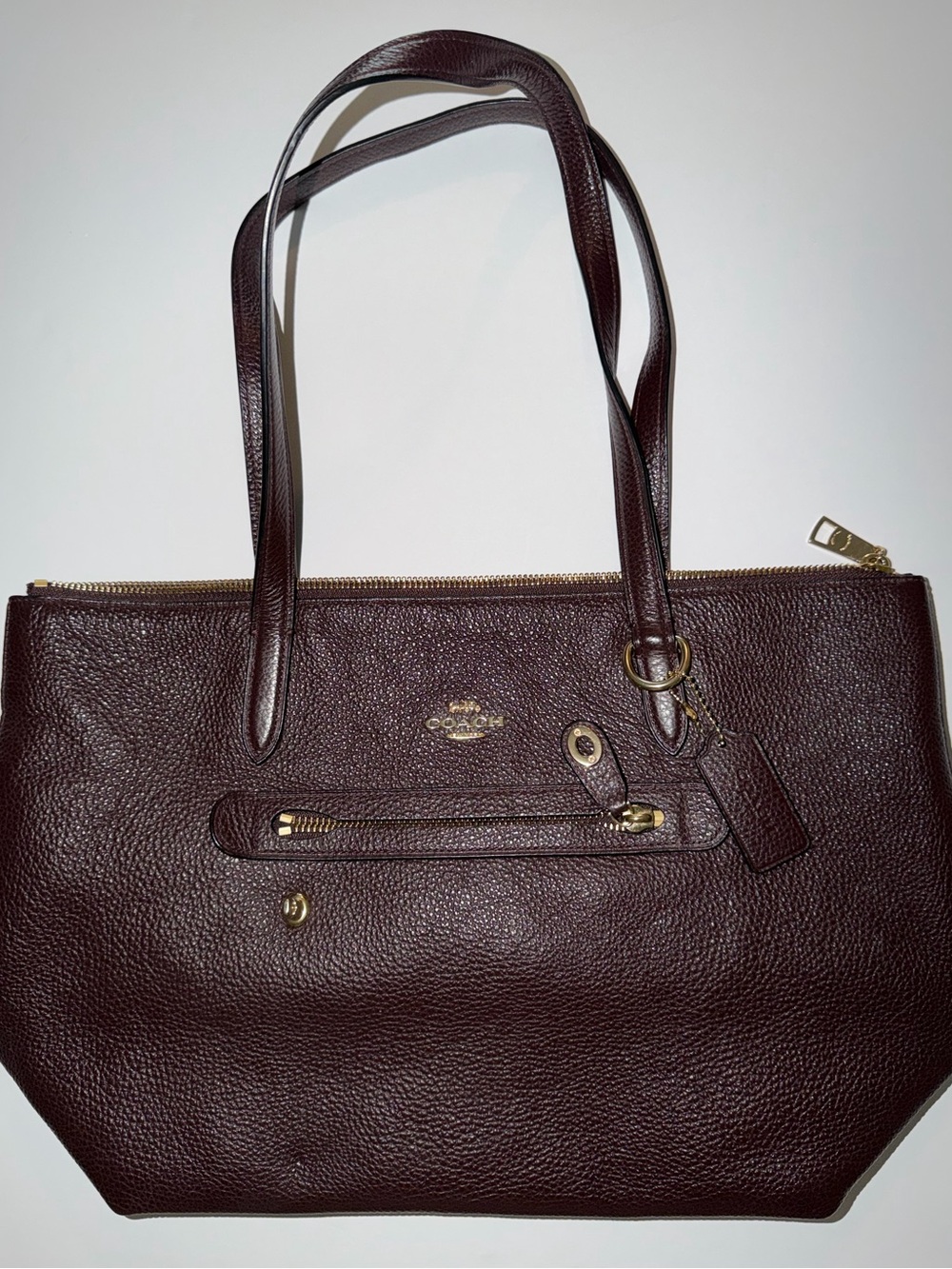 Coach Taylor Tote
Pebbled Leather-Oxblood